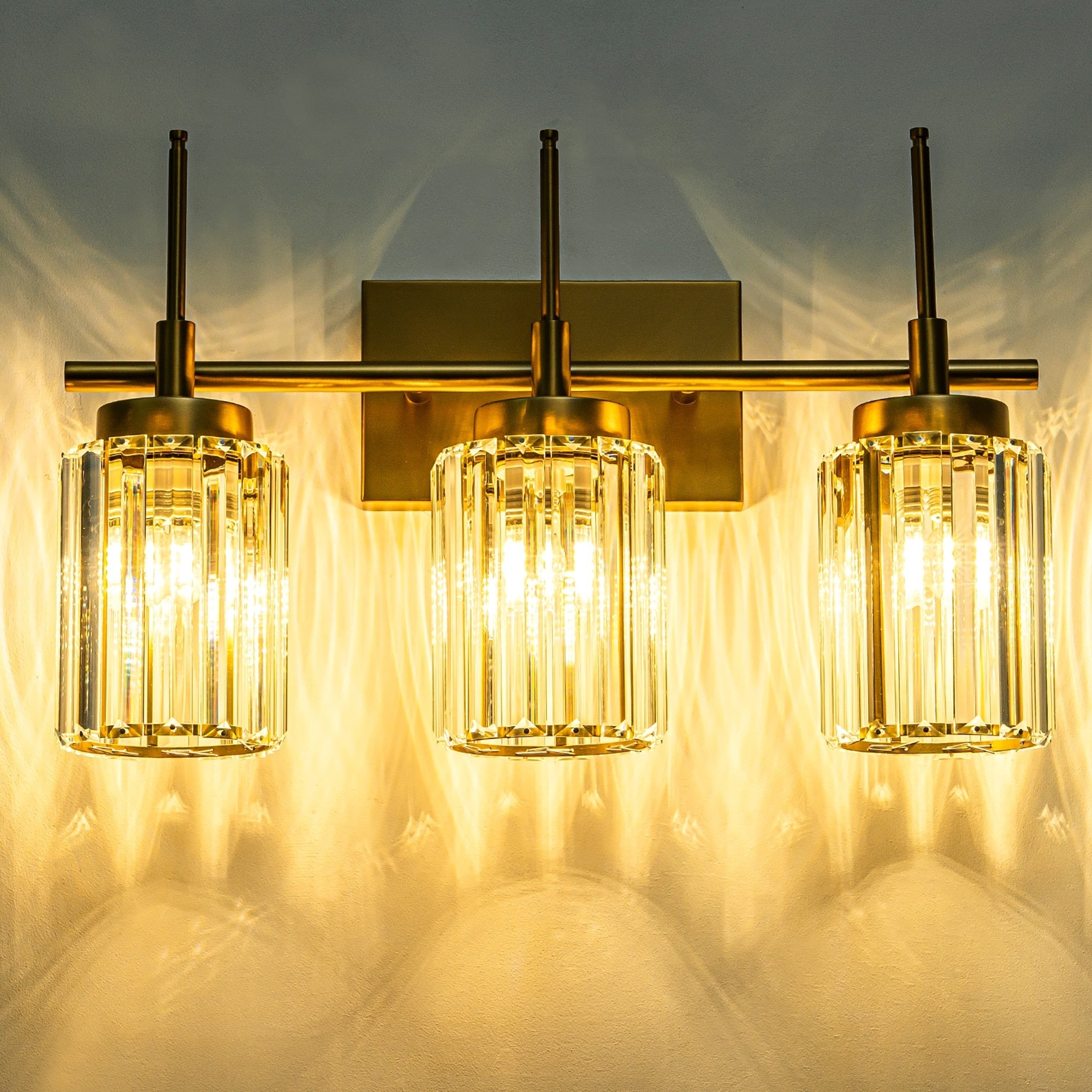 Applique murale moderne dorée à intensité variable, style cylindre glamour pour salle de bain, en cristal, pour meuble-lavabo