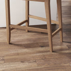 Tabouret de bar moderne Gracie, chaise rembourrée en boucle et pieds en bois brossé