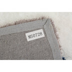 Tapis à poils longs Mateos au design abstrait