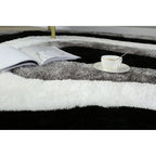 Tapis à poils longs Mateos au design abstrait