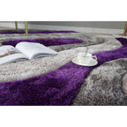 Tapis à poils longs Mateos au design abstrait