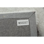 Tapis à poils longs Mateos au design abstrait