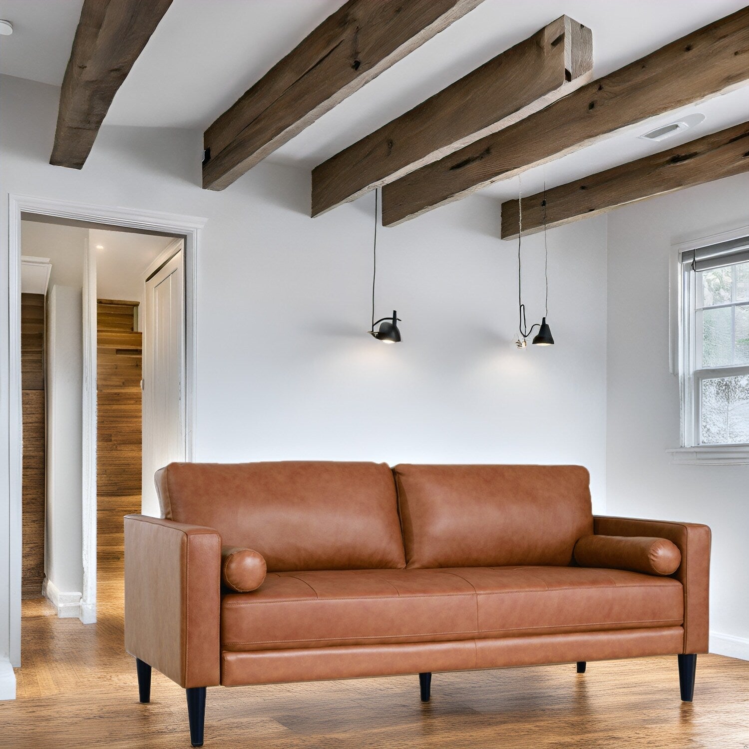 Canapé moderne en cuir véritable avec pieds en bois et coussin traversin supplémentaire